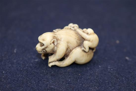 A 19th century Japanese ivory monkey group netsuke